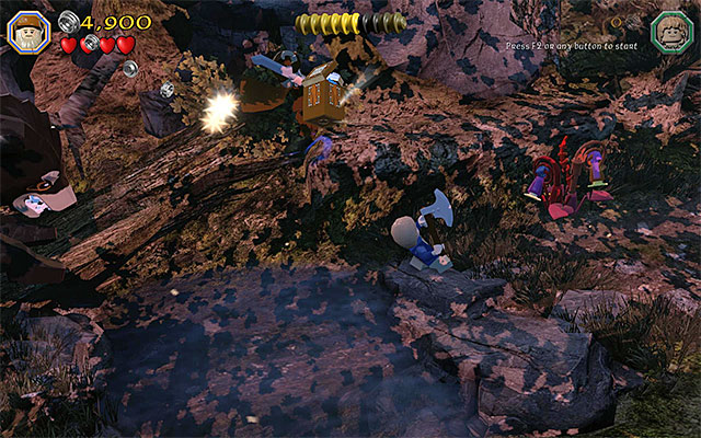 You will grab one of the minikits in the mid-air, where the character will take the jump automatically - Stage 9 (Queer Lodgings) | Main Stages - Collectibles - Main Stages - Collectibles - LEGO The Hobbit Game Guide & Walkthrough