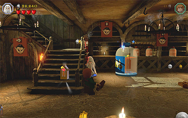 Check out the area under the stairs - Stage 9 (Queer Lodgings) | Main Stages - Collectibles - Main Stages - Collectibles - LEGO The Hobbit Game Guide & Walkthrough