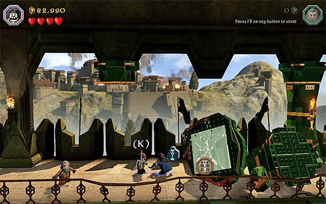 Removing the elements requires the cooperation of two characters - Stage 1 (Greatest Kingdom in Middle-Earth): Smaugs attack | Walkthrough - Walkthrough - LEGO The Hobbit Game Guide & Walkthrough