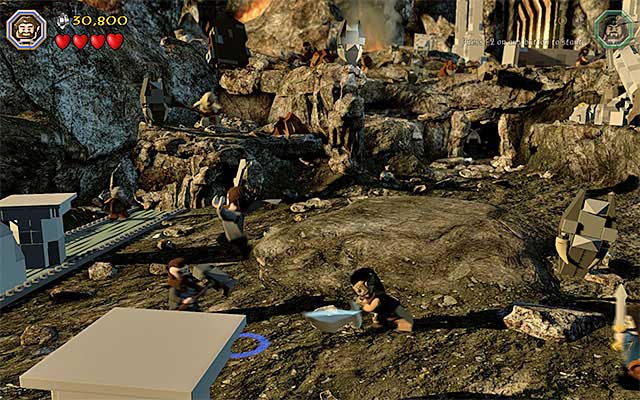Avoid stones tossed by the boss - Stage 3 (Azog the Defiler): The battle with Azog the Defiler | Walkthrough - Walkthrough - LEGO The Hobbit Game Guide & Walkthrough