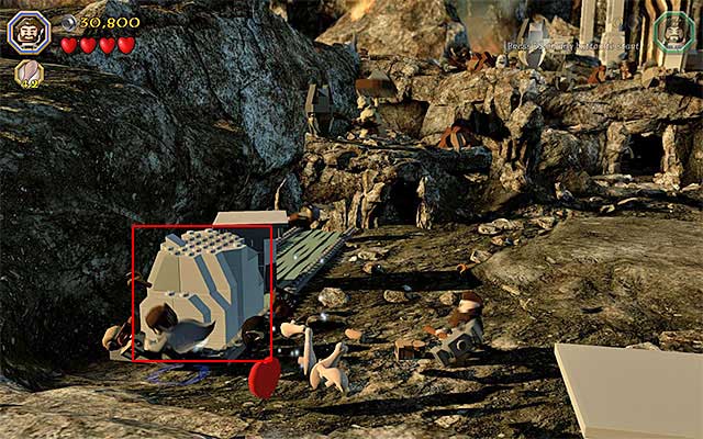 In order to make it over to the ledge, where Azog is, you need to stand next to the big block shown in the above screenshot - Stage 3 (Azog the Defiler): The battle with Azog the Defiler | Walkthrough - Walkthrough - LEGO The Hobbit Game Guide & Walkthrough