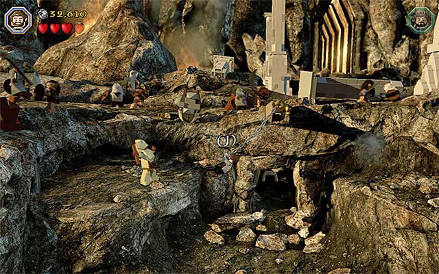 Swing and leap towards the ledge with Azog on it - Stage 3 (Azog the Defiler): The battle with Azog the Defiler | Walkthrough - Walkthrough - LEGO The Hobbit Game Guide & Walkthrough