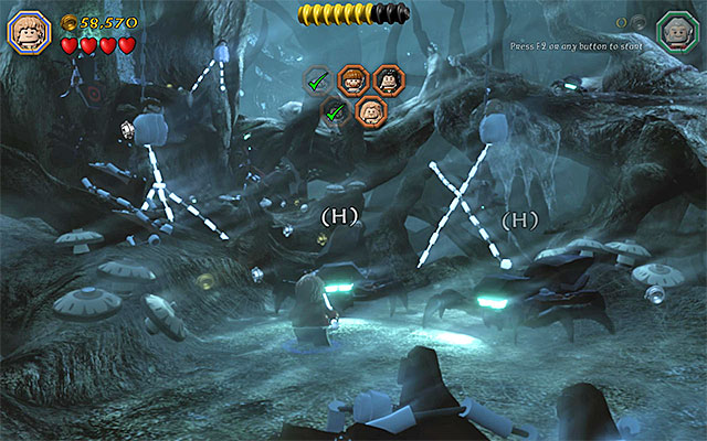 Make sure that you are wearing the ring and then deal with the spiders - Stage 10 (Flies and Spiders): The spider cave | Walkthrough | LEGO The Hobbit - Walkthrough - LEGO The Hobbit Game Guide & Walkthrough