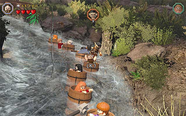 You need to tap the indicated keys rhythmically, thanks to which you will be throwing goblins off - Stage 11 (Barrels Out of Bond): Go down the river | Walkthrough - Walkthrough - LEGO The Hobbit Game Guide & Walkthrough