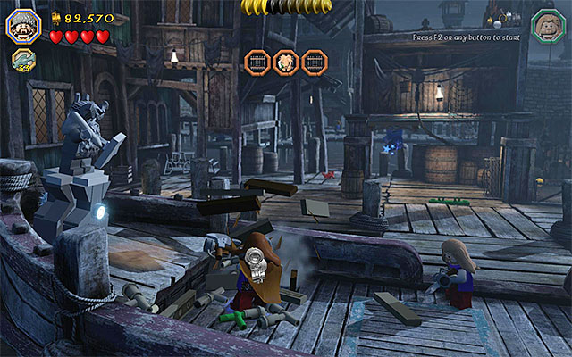 The ship with the statue and elements necessary to build a ladder - Stage 12 (A Warm Welcome): The docks | Walkthrough | LEGO The Hobbit - Walkthrough - LEGO The Hobbit Game Guide & Walkthrough