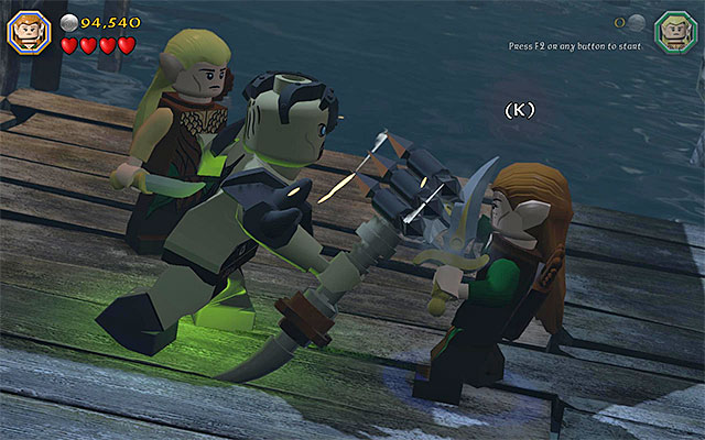 While fighting Bolg, you need to press the buttons that appear on the screen - Stage 12 (A Warm Welcome): The battle with Bolg | Walkthrough | LEGO The Hobbit - Walkthrough - LEGO The Hobbit Game Guide & Walkthrough