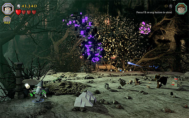 Run, jump around the arena and avoid the bricks that the boss throws - Stage 14 (The Necromancer): The battle with Sauron | Walkthrough - Walkthrough - LEGO The Hobbit Game Guide & Walkthrough