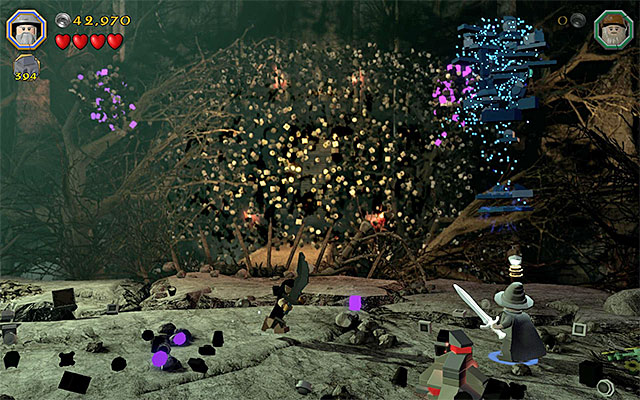 Use the bricks on the ground to build a tower - Stage 14 (The Necromancer): The battle with Sauron | Walkthrough - Walkthrough - LEGO The Hobbit Game Guide & Walkthrough