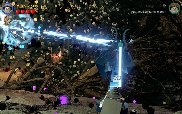This is not it, however, because in the initial part of this stage, you need to send a magic projectile towards the recently built tower - Stage 14 (The Necromancer): The battle with Sauron | Walkthrough - Walkthrough - LEGO The Hobbit Game Guide & Walkthrough