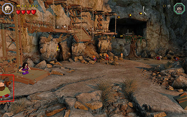 Start the exploration of the larger area by using the Save Statue - Stage 15 (On the Doorstep): The climb | Walkthrough - Walkthrough - LEGO The Hobbit Game Guide & Walkthrough
