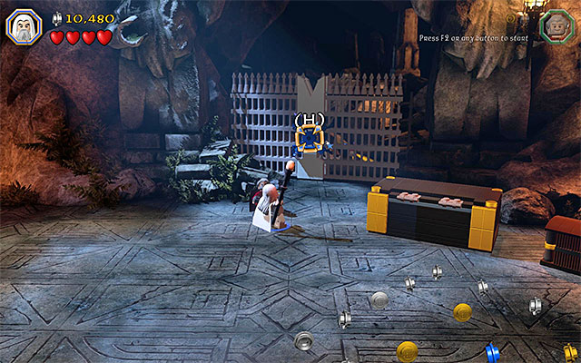 You need to smash the blue padlock on the gate - Stage 15 (On the Doorstep) | Main Stages - Collectibles - Main Stages - Collectibles - LEGO The Hobbit Game Guide & Walkthrough
