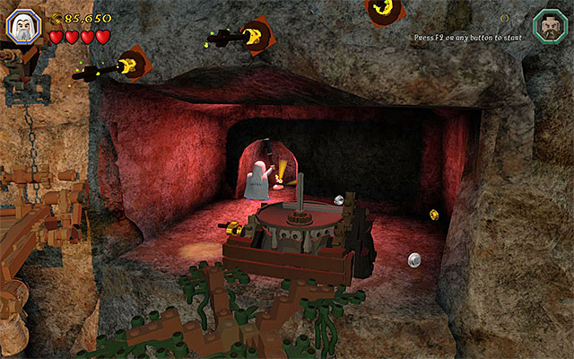 You need to illuminate the area around the collectible - Stage 15 (On the Doorstep) | Main Stages - Collectibles - Main Stages - Collectibles - LEGO The Hobbit Game Guide & Walkthrough