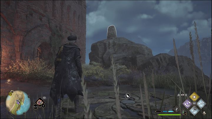 The task is to destroy five stone structures using spells such as Bombarda or Confringo - Hogwarts Legacy: Manor Cape - all Merlin Trials - Hogwarts Legacy: Merlins Trials - Hogwarts Legacy Guide