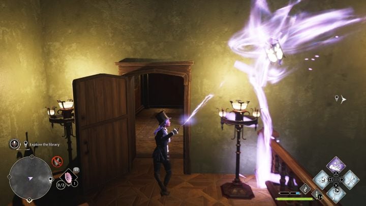 As you bring the lantern closer, a door will appear and open before you - Hogwarts Legacy: Minding Your Own Business - Hogwarts Legacy: Hogsmeade Side Quests - Hogwarts Legacy Guide