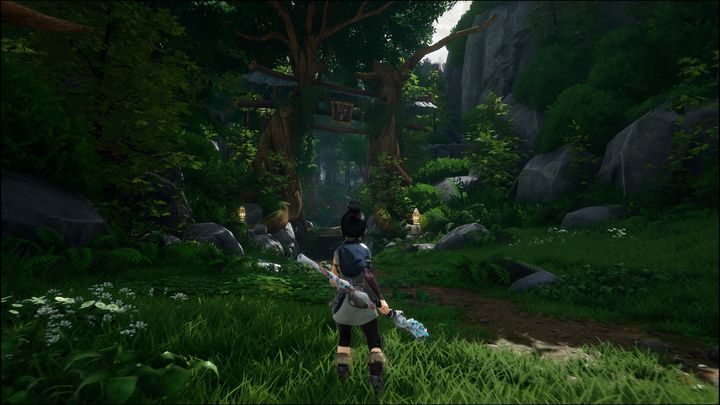 Once you spot the siblings, turn left and you will see a passage past two tall trees - Kena Bridge of Spirits: Find Rusu - walkthrough - Walkthrough - Kena Bridge of Spirits Guide