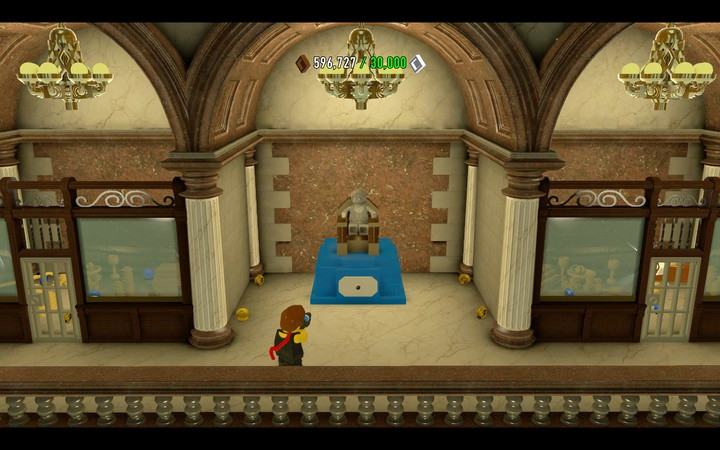 Paint the statue on the first floor and you will gain access to doors on both sides - Secrets in the bank | Walkthrough - Chapter 6 - LEGO City: Undercover Game Guide