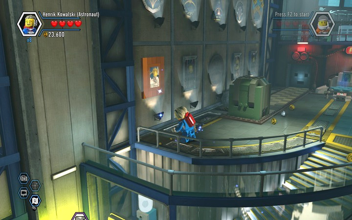 On the left and right side you will find places for the missing paintings on the wall - Secrets in the hangar | Walkthrough - Chapter 7 - LEGO City: Undercover Game Guide
