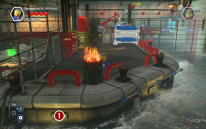 You will find a shield piece in place (1) - Secrets in the firefighters building | Walkthrough - Chapter 10 - LEGO City: Undercover Game Guide