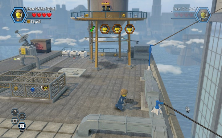 Jump onto the rope to get to the next building - The TV station building | Chapter 2 - Chapter 2 - LEGO City: Undercover Game Guide