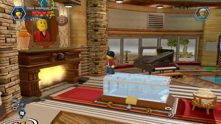 First, take down the painting from the wall - Stealing from Blackwell | Chapter 11 | Walkthrough - Chapter 11 - LEGO City: Undercover Game Guide