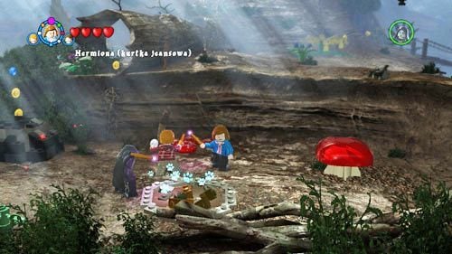 Go all the way to the left to reach the overturned trunk, jump from the edge to the location below and find a digging spot - Harry Potter Years 5-7: Tokens - Hogwarts, part 1 - Tokens - LEGO Harry Potter Years 5-7 Guide