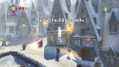 Jump on the safe on the left side of the village and you will receive Marietta Edgecombe token - Harry Potter Years 5-7: Tokens - Hogwarts, part 1 - Tokens - LEGO Harry Potter Years 5-7 Guide