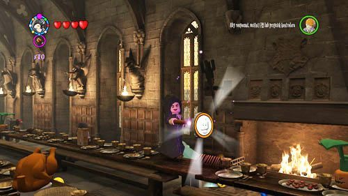 Find a bowl of fruit standing on the table, opposite the fireplace - Harry Potter Years 5-7: Tokens - Hogwarts, part 4 - Tokens - LEGO Harry Potter Years 5-7 Guide
