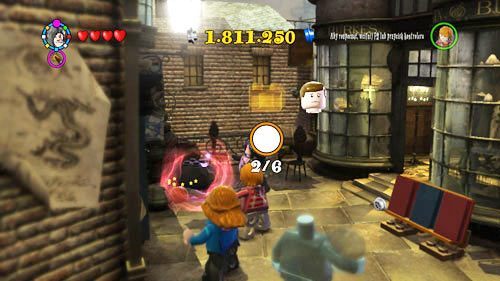 There is a pile of stones outside Borgin & Berkes, the student lies under them - Harry Potter Years 5-7: Students in Peril, part 1 - Other collectibles - LEGO Harry Potter Years 5-7 Guide