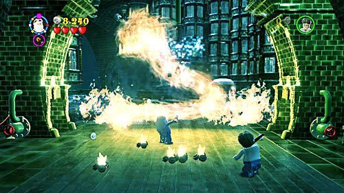 Then, when a fiery dragon appears, you have to assemble a sprinkle extinguisher as soon as possible by using the WL spell - Harry Potter Years 5-7: A Veiled Threat - Year 5 - LEGO Harry Potter Years 5-7 Guide