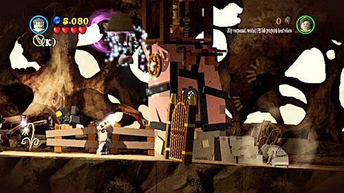 Destroy the gold bricks by using the first brother and assemble a bell - Harry Potter Years 5-7: Lovegoods Lunacy, part 2 - Year 7 - LEGO Harry Potter Years 5-7 Guide