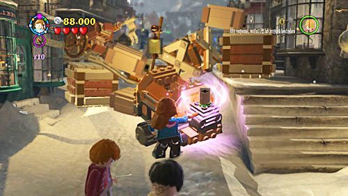 Take out the woodworking machine, activate it (the crank is right next to the machine) - Harry Potter Years 5-7: Back to School - Year 7 - LEGO Harry Potter Years 5-7 Guide