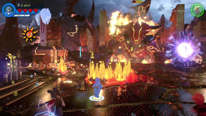 After that you must switch to Captain America and approach the fire presented in the picture - LEGO Marvel 2: Mission 7 - Surtur-n Doom Walkthrough - LEGO Marvel 2: Walkthrough - LEGO Marvel Super Heroes 2 Game Guide