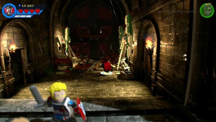 As Groot, you must go through the gate and destroy all objects made out of bricks - LEGO Marvel 2: Mission 3 - Castle Hassle Walkthrough - LEGO Marvel 2: Walkthrough - LEGO Marvel Super Heroes 2 Game Guide