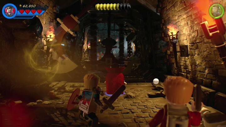 Inside, switch to Doctor Strange and use his special power to turn the traps off (those, that block the access to another part of the hall) - LEGO Marvel 2: Mission 3 - Castle Hassle Walkthrough - LEGO Marvel 2: Walkthrough - LEGO Marvel Super Heroes 2 Game Guide