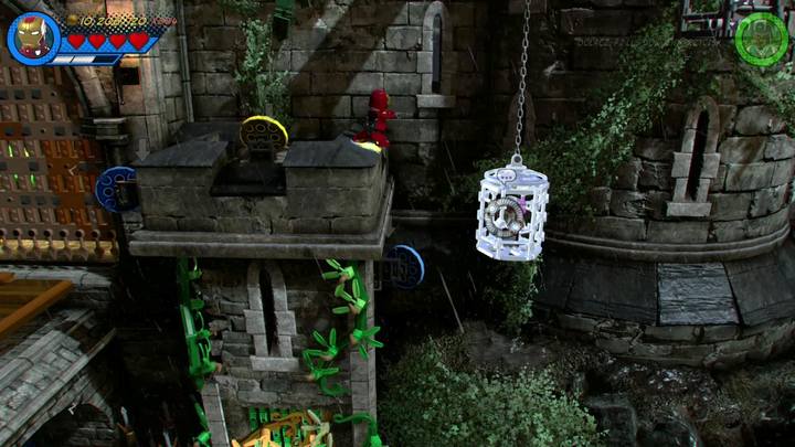 Fly towards the castle wall on the right (see screenshot), and destroy the silver cage to rescue Stan Lee - LEGO Marvel 2: Mission 3 - Castle Hassle Secrets - LEGO Marvel 2: Mission secrets - LEGO Marvel Super Heroes 2 Game Guide