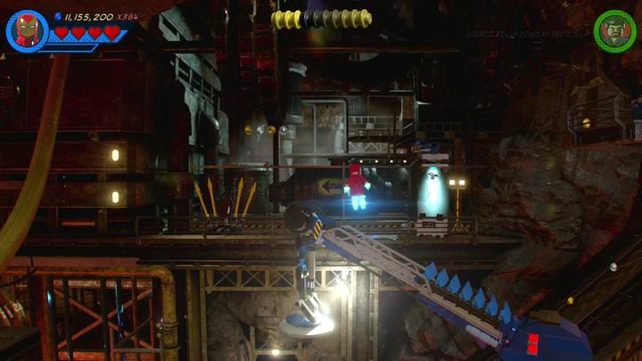 The fourth Minikit is on a balcony, right by the crane - LEGO Marvel 2: Mission 4 - Whats Klaws is Minded Secrets - LEGO Marvel 2: Mission secrets - LEGO Marvel Super Heroes 2 Game Guide