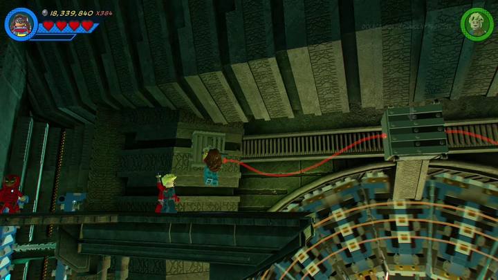 On the balconies above you will find two handles placed on opposite sides - LEGO Marvel 2: Mission 14 - Halo, is it Kree Youre Looking For Secrets - LEGO Marvel 2: Mission secrets - LEGO Marvel Super Heroes 2 Game Guide