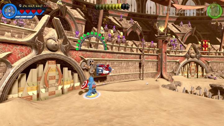 The last minikit is on the left side of the arena, in the entrance through which enemies are coming during the second phase of the mission - LEGO Marvel 2: Mission 15 - Red King Revelation Secrets - LEGO Marvel 2: Mission secrets - LEGO Marvel Super Heroes 2 Game Guide