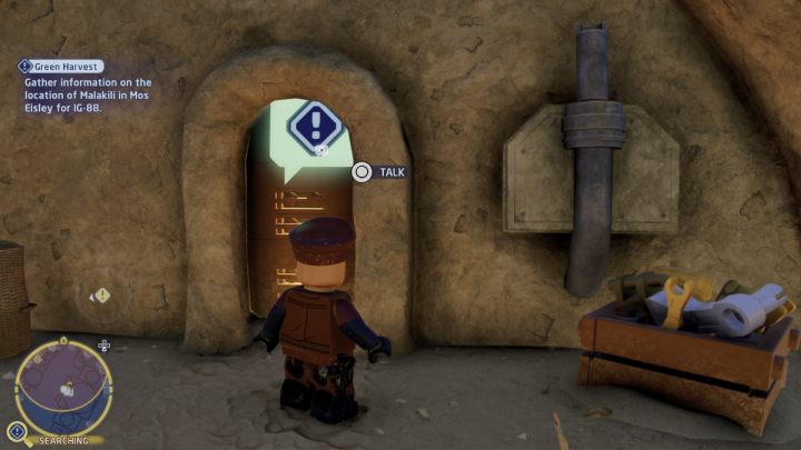 After you talk to the service member, the IG-88 droid will appear - LEGO Skywalker Saga: Green Harvest - walkthrough - LEGO Skywalker Saga: Tatooine - Mos Eisley - LEGO Skywalker Saga Guide