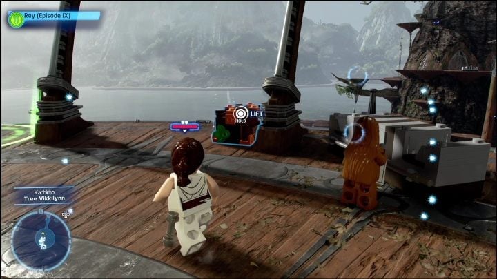 This brick is hanging above the wooden platform and you can reach it by using the yellow ladder - LEGO Skywalker Saga: Kachirho - list of puzzles - LEGO Skywalker Saga: Kashyyyk - LEGO Skywalker Saga Guide
