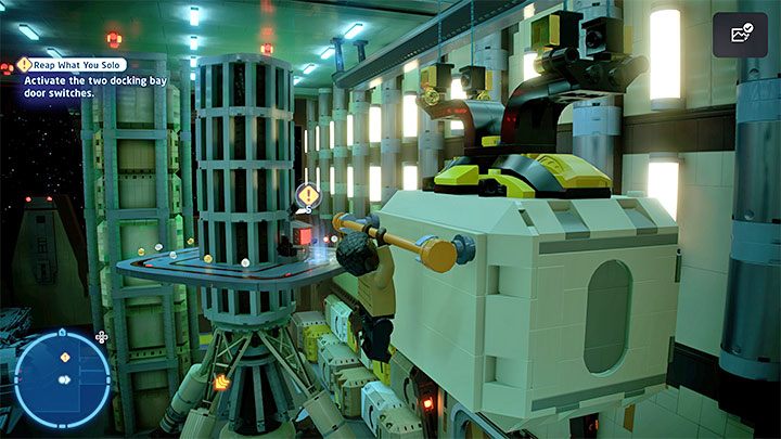 Wait for the container to change its position and grab the second handle of the neighboring container, which will stop nearby - LEGO Skywalker Saga: Reap What You Solo - walkthrough - LEGO Skywalker Saga: Episode 7 - The Force Awakens - LEGO Skywalker Saga Guide