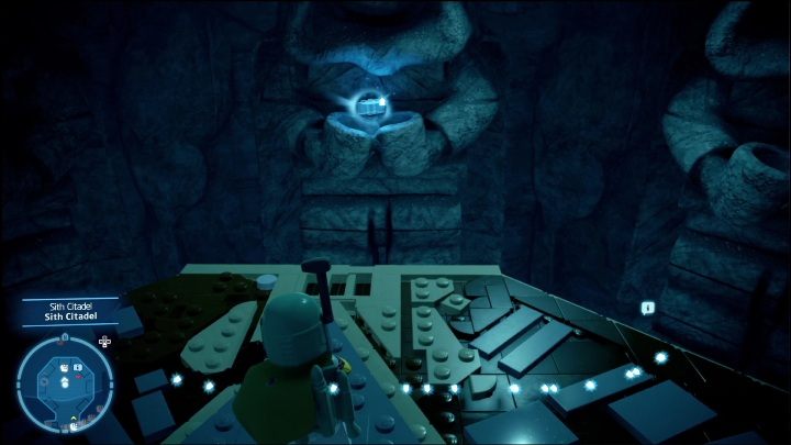 This brick is lying in the palms of the statue you will pass while riding down the elevator to the Citadel - LEGO Skywalker Saga: Sith Citadel - list of all puzzles - LEGO Skywalker Saga: Exegol - LEGO Skywalker Saga Guide