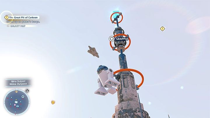 Your task is to reach the top of the tower shown in the picture above - LEGO Skywalker Saga: Niima Outpost - list of all puzzles - LEGO Skywalker Saga: Jakku - LEGO Skywalker Saga Guide