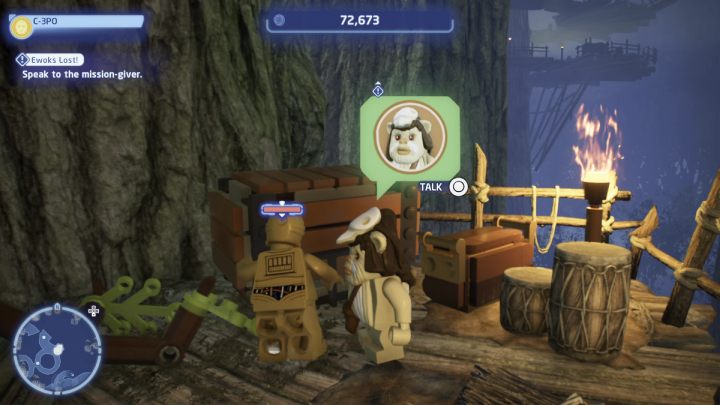 While controlling the protocol droid, talk to the NPC in the Ewok village - LEGO Skywalker Saga: Ewoks Lost! - walkthrough - LEGO Skywalker Saga: Endor - the ewok village - LEGO Skywalker Saga Guide