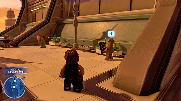 The Wookiee is standing against the wall of one of the larger buildings - LEGO Skywalker Saga: Wheres the Wookiee? - list of all (part 1) - LEGO Skywalker Saga: Challenges - LEGO Skywalker Saga Guide