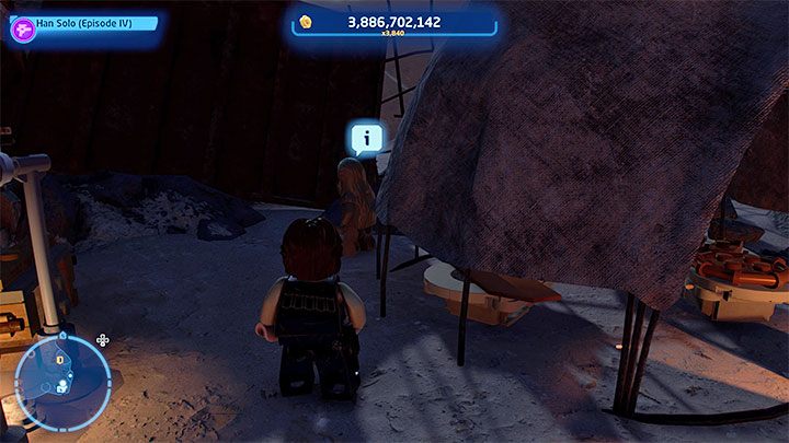 The Wookiee is standing next to one of the shacks in a dimly lit place - LEGO Skywalker Saga: Wheres the Wookiee? - list of all (part 1) - LEGO Skywalker Saga: Challenges - LEGO Skywalker Saga Guide