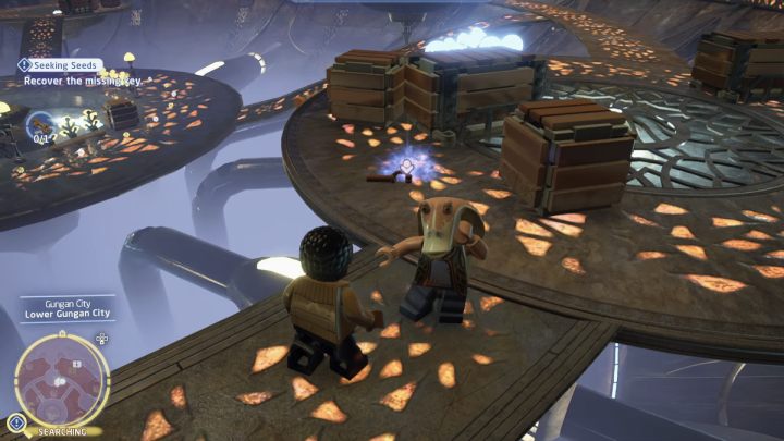 Go down to the lower level of the city and pick up the key from the crates and the shaky Gungan - LEGO Skywalker Saga: Seeking Seeds - walkthrough - LEGO Skywalker Saga: Jakku - Tuanul Village - LEGO Skywalker Saga Guide