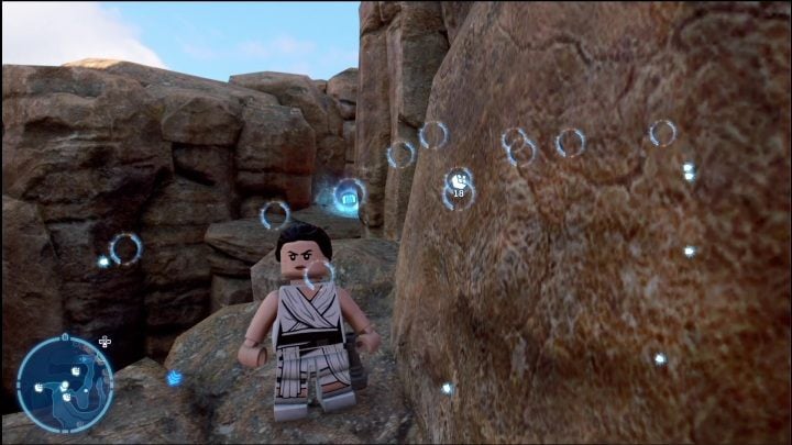 The brick is on a small rock ledge which you have to reach - LEGO Skywalker Saga: Jundland Wastes - list of all puzzles - LEGO Skywalker Saga: Tatooine - LEGO Skywalker Saga Guide