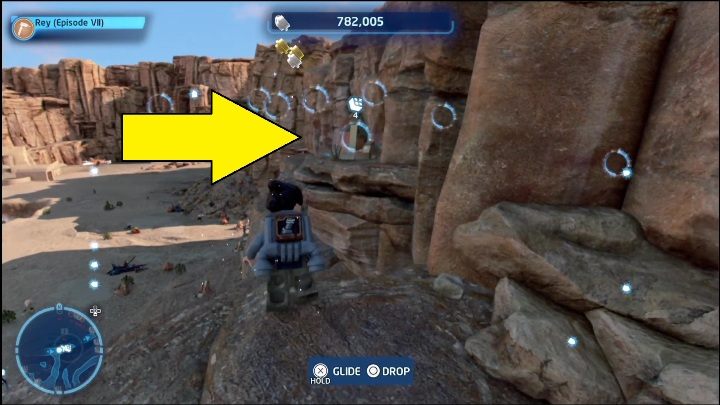 Another brick is located on a rock ledge - LEGO Skywalker Saga: Jundland Wastes - list of all puzzles - LEGO Skywalker Saga: Tatooine - LEGO Skywalker Saga Guide