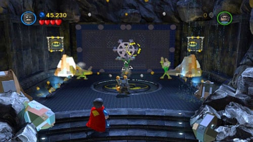 Use rockets to destroy silver wheel on the wall (picture) - Unwelcome Guests | Walkthrough - Walkthrough - LEGO Batman 2: DC Super Heroes Game Guide & Walkthrough